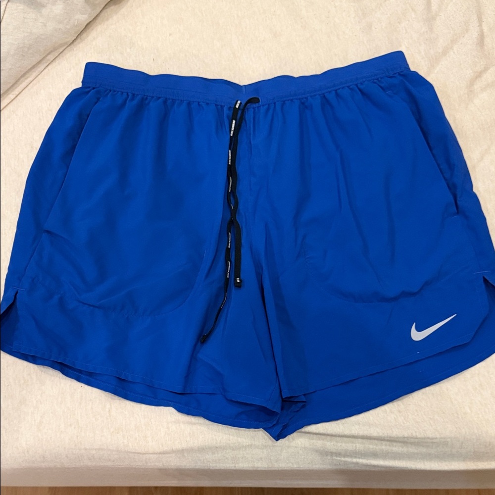 Nike Men’s Blue Athletic Shorts. Nike Stride Running Shirts